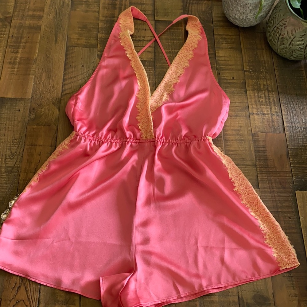 Pink romper size 8 women never worn